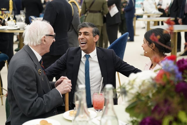 Prime Minister Rishi Sunak and Akshata Murty meet veterans during a lunch following the UK's national commemorative event for the 80th anniversary of D-Day on Southsea Common in Portsmouth, Hampshire. Photo credit should read: Andrew Matthews/PA Wire