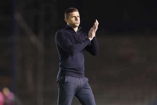 Pompey head coach John Mousinho paid tribute to the fans' role in Exeter City victory. Pic: Jason Brown.