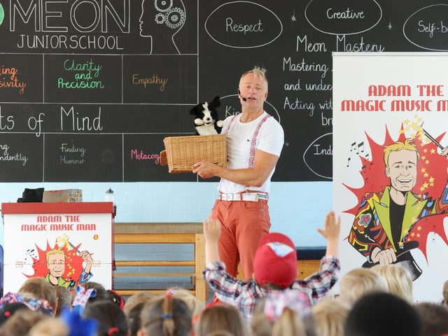 Adam The Magic Music Man entertaining the children at Meon Junior School at celebrations for The Queen's Platinum Jubilee