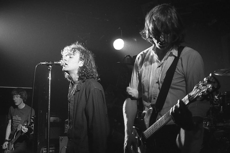 REM at The Marquee Club, London in April 1984, with from left, bassist Mike Mills, singer Michael Stipe and guitarist Peter Buck