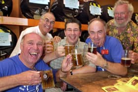 Portsmouth 24th Beer Festival at The Guildhall in 2004, where event organiser Shep Woolley (left) is getting into the spirit with (left to right) Phil Souter, Colin Rowland, beer brewer Brian "Stumpy" Lewis from Hill Head and Bob Batchelor, on the stand of Hampshire beers. Picture: Michael Scaddan 044171-0045