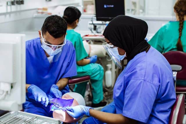University of Portsmouth Dental Academy students working and training