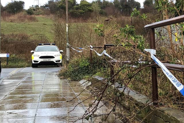 Police car and tape at the scene. Picture: Tom Cotterill