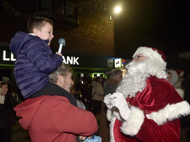 Christmas lights in High Street, Cosham, were switched on during the evening of Friday, November 22, 2024.
Pictured is: Teddy Justice (5) from Paulsgrove, meets Father Christmas.
Picture: Sarah Standing (221124-6423)