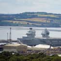 Aircraft carrier HMS Prince of Wales as it leaves  Rosyth docks after repairs. 
Photo: Andrew Milligan/PA Wire