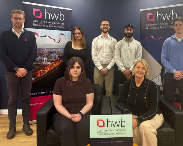 NEW STARTERS: The latest HWB recruits with Managing Director Tracy Jenkins, seated right, are from left, Tom Watson, Sophie Murray-Cousens (seated), Olivia Bryant, Tom Stanley, Dalbir Bhullar and Charlie Hodgson
