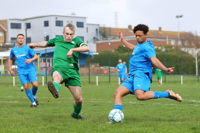 Paulsgrove's Callum Boateng (blue) v Overton.  Picture: Chris Moorhouse