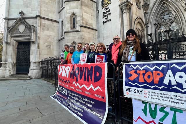Stop Aquind activists outside the Royal Courts of Justice, where Aquind hopes to overturn the government's quashing of its Portsmouth plans