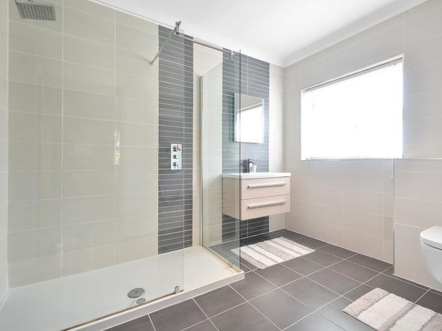 This four bedroom detached family home is on the market at a guide price of £950,000. It is listed by Fine and Country.