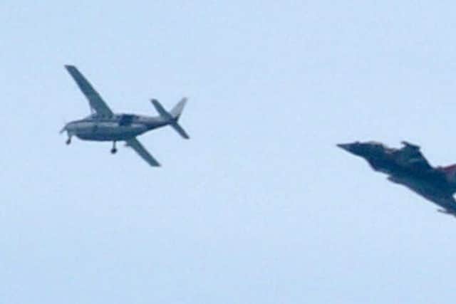 RAF Typhoon and small plane above Eastbourne on Monday September 6, 2021.
Picture: Tabitha White
