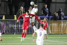 Manny Duku heads Hawks' second goal against Hungerford Town. Picture by Dave Haines