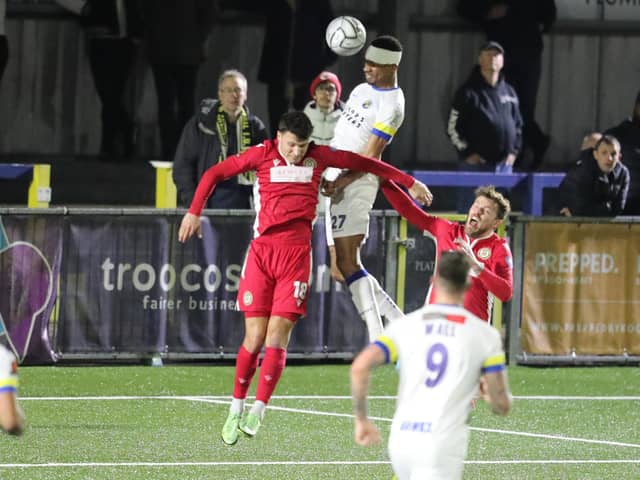 Manny Duku heads Hawks' second goal against Hungerford Town. Picture by Dave Haines