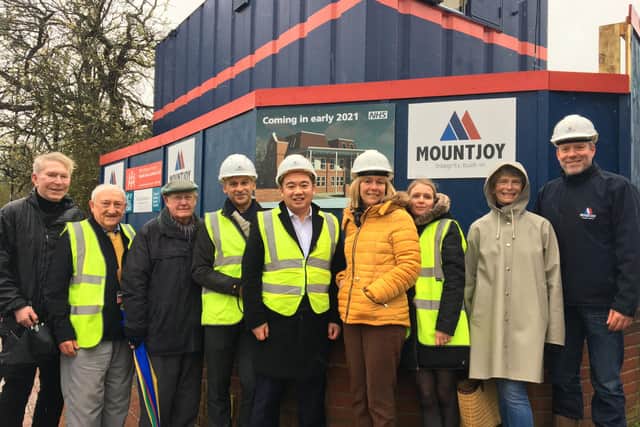 Group gathers at the building site for the new Emsworth surgery including Havant MP Alan Mak (centre)
