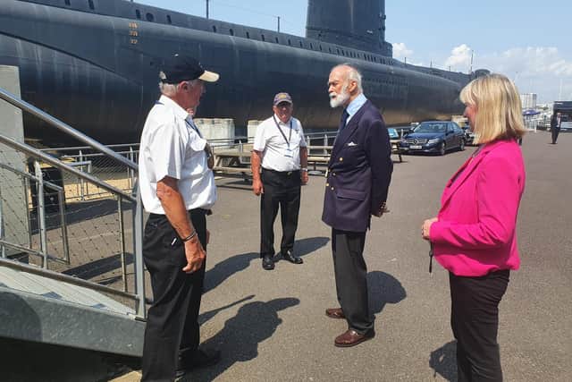 HRH Prince Michael of Kent with guides for HMS Alliance at the Royal Navy Submarine Museum, Gosport. Credit NMRN