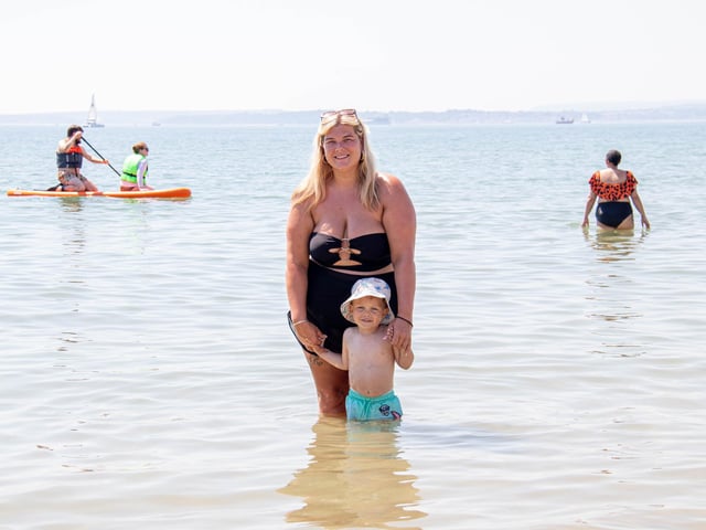 Pictured: Mother and son in the sea
