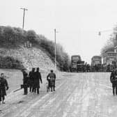 Iced up outside The George. In January 1940 it was so cold that buses could not get down Portsdown Hill because of the ice on London Road. Picture: Tony Triggs collection.