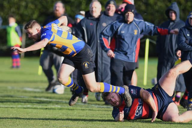 A Gosport & Fareham 2s player is stopped in his tracks. Picture: Neil Marshall
