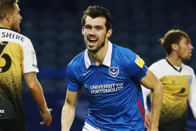 John Marquis celebrates scoring for Pompey earlier this season against Crewe. Picture: Joe Pepler