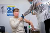 People being vaccinated at Emsworth Baptist Church, Emsworth on 19 January 2021. Pictured:  Dorothy Palmer getting her vaccine by Dr Caroline Kenedy-Cooke. Picture: Habibur Rahman