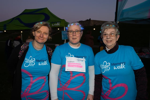 Helen Restall, Toni Vogel and Fiona Sweet came to Castle Field, Southsea to take part in the Alzheimers Society Glow Walk on Friday evening. Photos by Alex Shute



