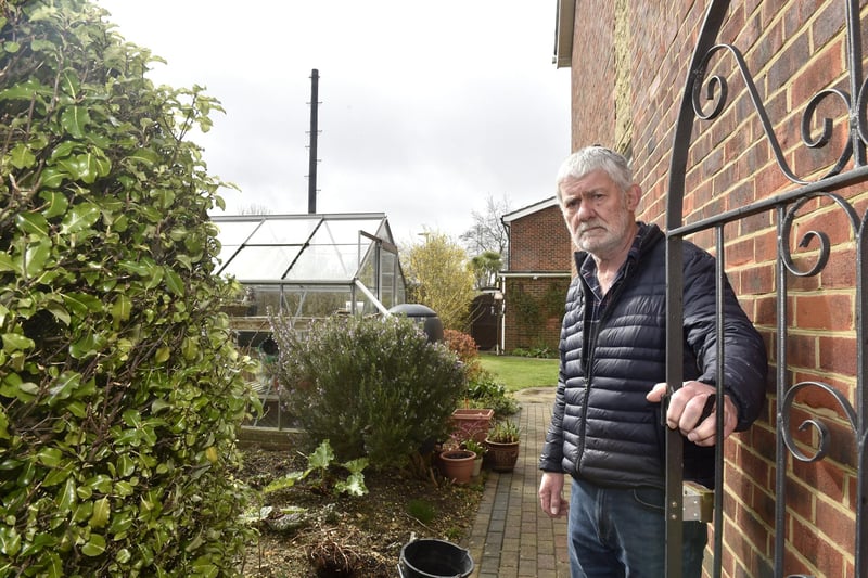 John Rowlands from Woodside, Gosport, is angry that Toob has installed an "eyesore" telegraph pole meters from his garden without prior consultation. Picture: Sarah Standing