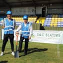 Hawks manager Paul Doswell and MP Alan Mak prepare to start digging up the Westleigh Park pitch this morning. Photo by Dave Haines.