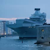 Pictured: Royal Navy flagship HMS Queen Elizabeth left Portsmouth. 

HMS Queen Elizabeth is the largest and most powerful vessel ever constructed for the Royal Navy. It is capable of carrying up to 40 aircraft.

© Will Dax/Solent News & Photo Agency