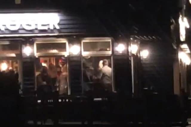 Punters are recorded singing and dancing without masks in the Jolly Roger pub, Gosport, in a breach of social distancing rules.