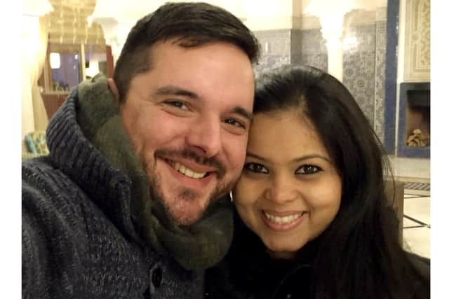 Caption: Joshi and Surbhi Cole, Simba's distraught owners.