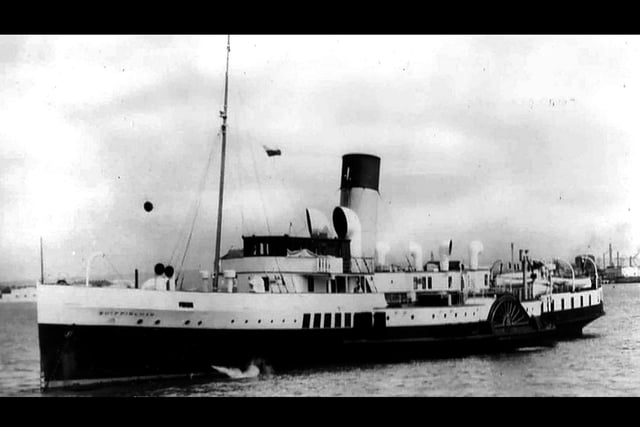 Paddle steamer Whippingham at anchor in the Solent after coaling duties off Southsea beach. The black ball indicates that she is at anchor.  P S Whippingham was a passenger paddle steamer built for the Southern Railway in 1930. After distinguished war service, she returned to ferry work until she was scrapped in 1963.Picture: Mike Nolan collection