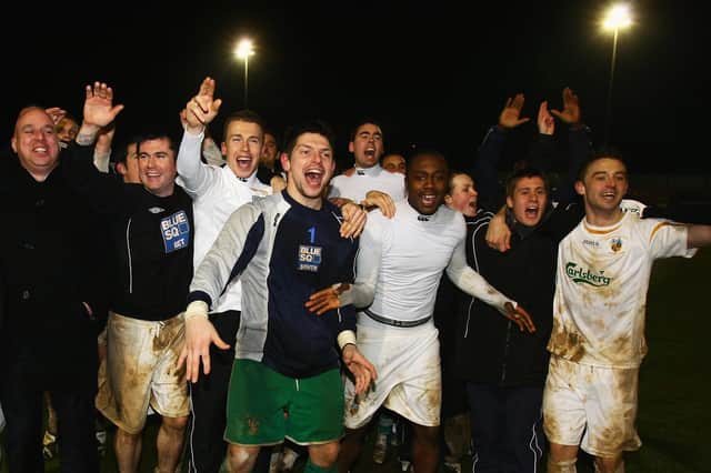 Hawks players celebrate their third round FA Cup replay win against Swansea in January 2008. Picture: Mike Hewitt/Getty Images.