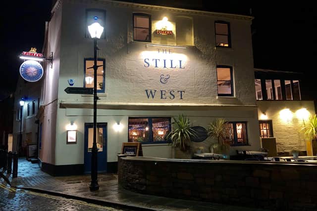 An exterior view of the Still and West in Bath Square, Old Portsmouth.
