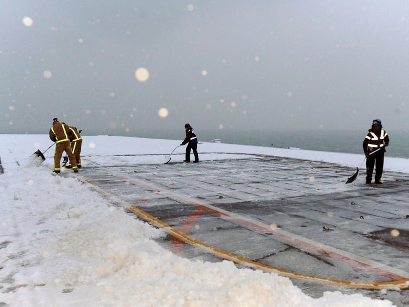 Ark in the snow 2nd Dec 2010. Taken on the Flight Deck of HMS Ark Royal during her final entrance to Portsmouth. Whilst rounding the Isle of Wight the Flight Deck was blanketed in snow. Picture: LA(PHOT) Abbie Gadd