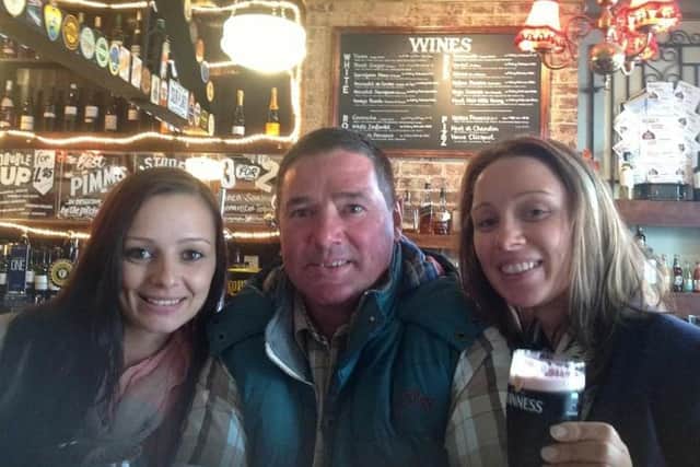 Amy Oliver, left, pictured with dad Andrew, 53, and older sister Lucy, 33.