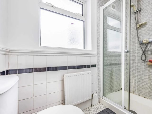 This property comes with three double bedrooms, two bathrooms and two reception rooms.
