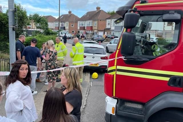 Emergency crews have been called to a car flipped on to its roof in a road in Drayton.