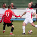 Tom Jeffes, right, in action for Horndean at Fareham last season. Picture: Keith Woodland
