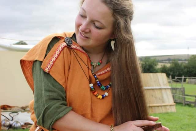 Bea Helmes of Herigeas Hundas in traditional Saxon clothing. Picture by Sarah Wingrove