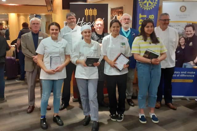 The Rotary Young Chef competition took place at Havant and South Downs College. Back Row (l - r) Ray Drake, Phil Clark, Ollie Clift, Lawrence Tristram, Clive Wright. Front row: prize winners including overall winner Macie-May Bissett, second left