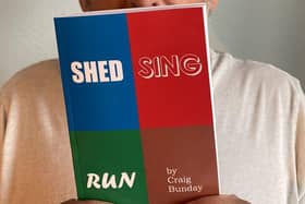 Craig with a copy of 'Shed Sing Run'