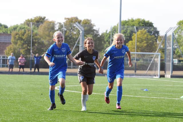 Pompey in the Community’s girl and women football development programme training at The Cowplain School in Hart Plain Avenue,Cowplain.

Pictured is: (l-r) Elsie Gordon (11) from Waterlooville, Lacey Webb (11) from Petersfield and Lily Wiseman (10) from Portsmouth.

Picture: Sarah Standing (090822-8337)