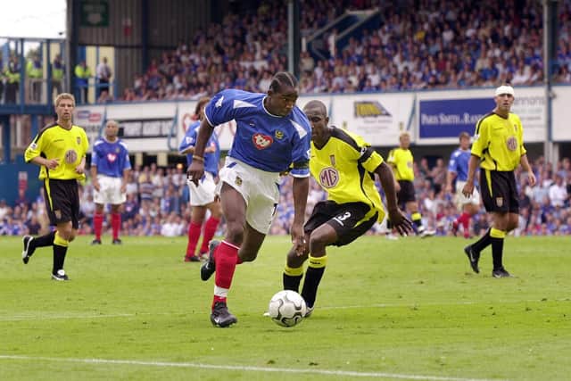 Vincent Pericard takes on Aston Villa's Jlloyd Samuel in the opening game of the 2003-04 Premier League season. Picture: Jonathan Brady