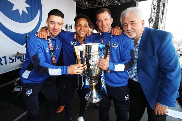 Kyle Bennett still keeps in touch with League Two title-winning team-mates Enda Stevens and Michael Doyle. With former chairman Iain McInnes also pictured. Picture: Joe Pepler