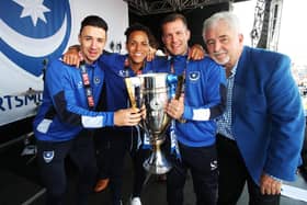 Kyle Bennett still keeps in touch with League Two title-winning team-mates Enda Stevens and Michael Doyle. With former chairman Iain McInnes also pictured. Picture: Joe Pepler