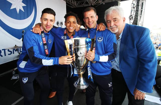 Kyle Bennett still keeps in touch with League Two title-winning team-mates Enda Stevens and Michael Doyle. With former chairman Iain McInnes also pictured. Picture: Joe Pepler