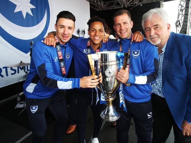 Kyle Bennett still keeps in touch with League Two title-winning team-mates Enda Stevens and Michael Doyle. With former chairman Iain McInnes also pictured. Picture: Joe Pepler