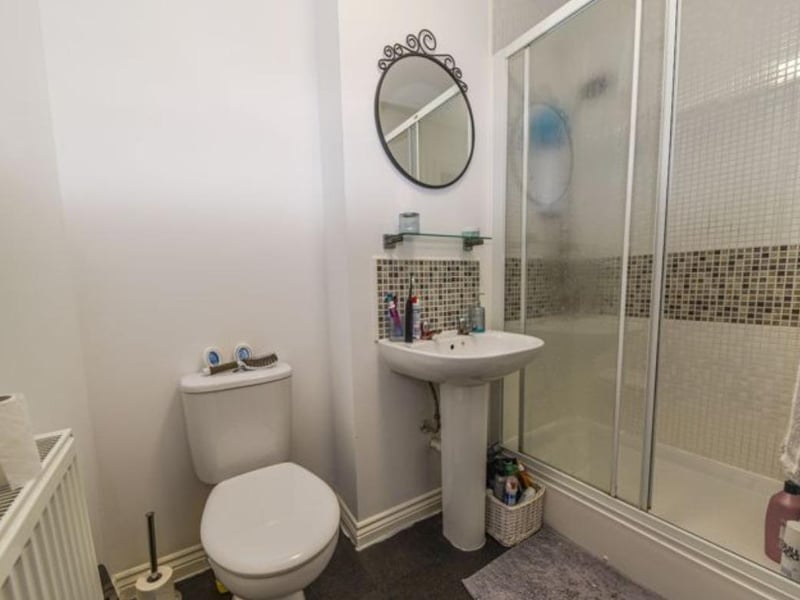 The listing says: "Wow wow wow modern open plan living and within walking distance of local schools and college. A four bedroom terrace town house situated in Cosham, near Portsmouth. This property benefits from double glazing, gas central heating system, driveway parking, mature landscaped rear gardens, modern open plan living and kitchen area, cloakroom/W.C, family bathroom, bedroom one with en-suite, and viewing is a real must."