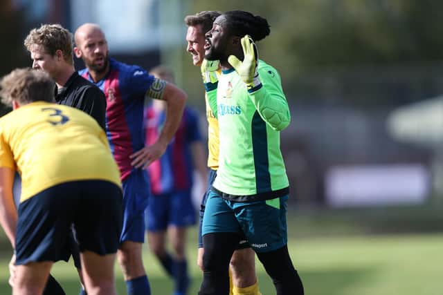 Downton keeper Ernest Osei protests his innocence, but is about to be sent off at US Portsmouth. Picture: Chris Moorhouse