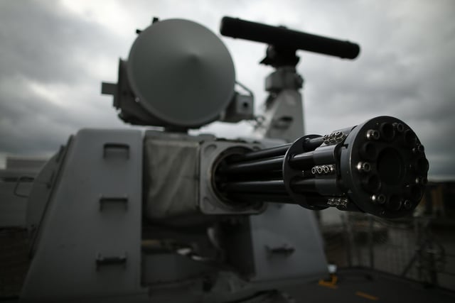 A heavy weapon machine gun is pictured on HMS Illustrious. Photo by Dan Kitwood/Getty Images