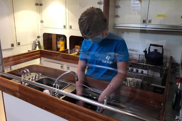Perspex screens have been erected below deck to mitigate the risk of infection.
